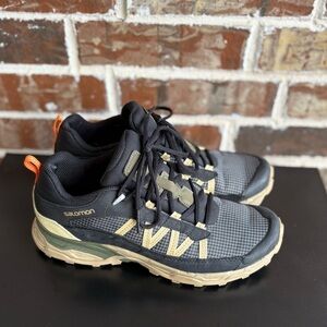 Salomon Women's Black and Tan Trail Running Shoes with Orange Pull Tabs